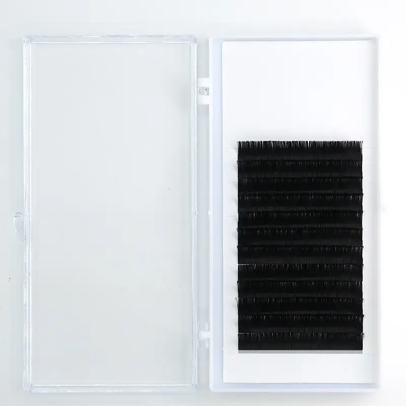 A set of 0.15 Curl Eyelash Extensions displayed in an open white case, showcasing the uniformity and precision of the lashes.