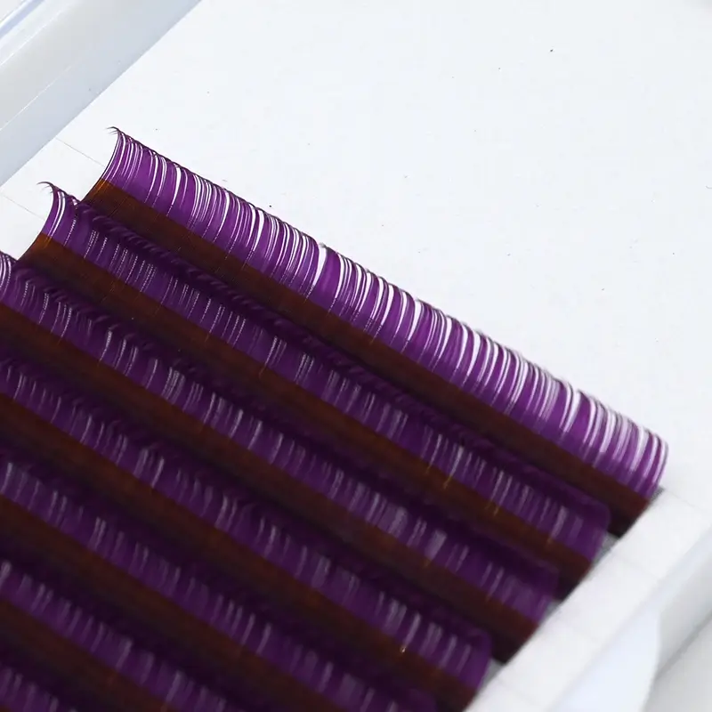 Vibrant View for purple eyelash extensions from SinoLash Factory, arranged in neat rows showcasing their gradient lengths