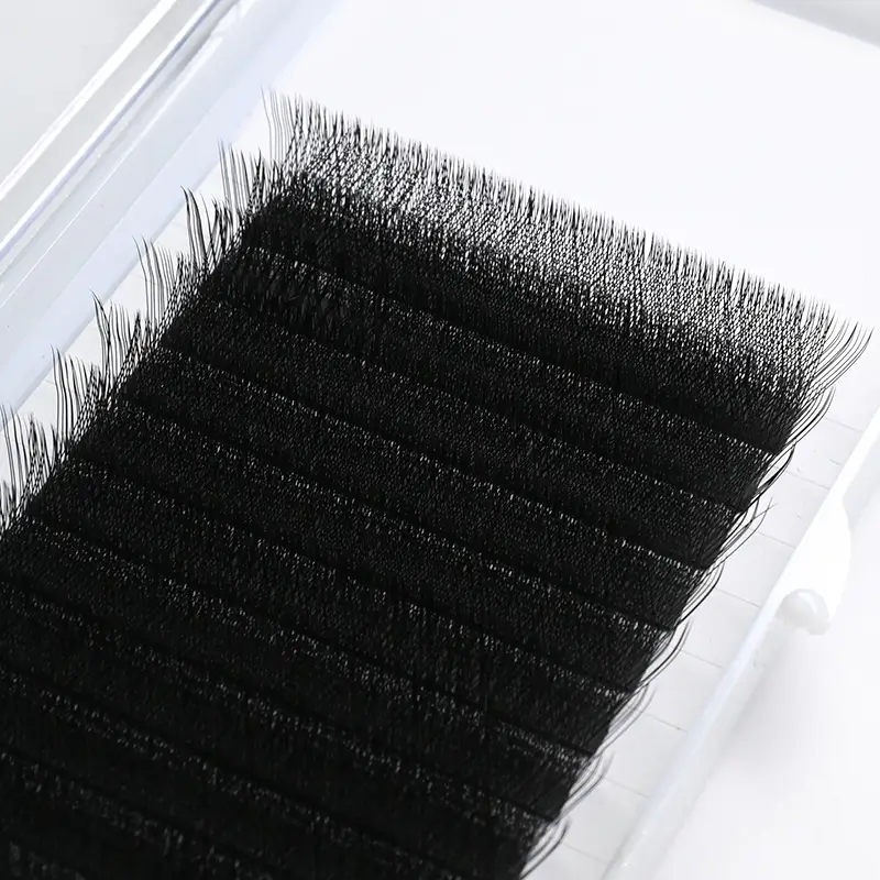 Detailed view of Clover Eyelash Extensions in a variety of lengths.