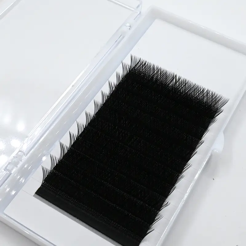 Close-up view of 0.07 YY Eyelash Extensions in packaging